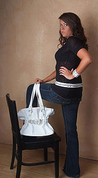 Model Wearing Kay West Handbag, Belt, & Cuff